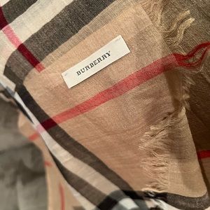 Burberry scarf. Signature plaid design. Measures 84”X 29”